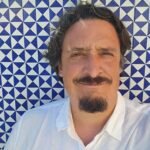 Matías Asún en una actividad de Greenpeace, combinando activismo ambiental y justicia social.